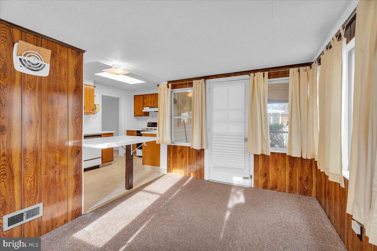 263 Hopkins Road Haddonfield, NJ 08033 - Photo 11 of 38 a view of kitchen with furniture and large window