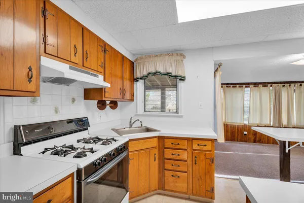 a spacious bathroom with a sink double vanity and a mirror