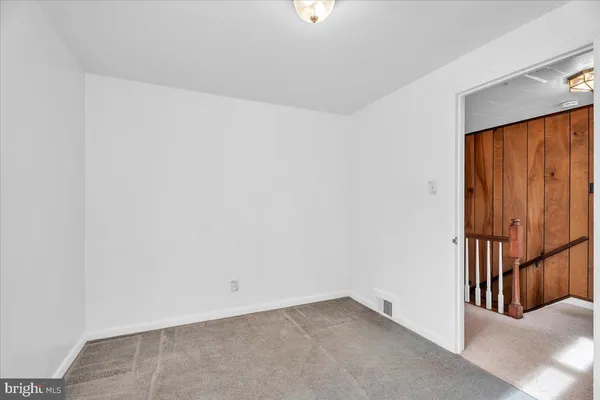 a view of a room that has a window in it