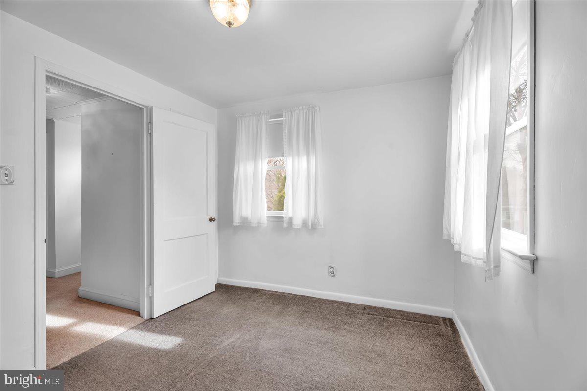 263 Hopkins Road Haddonfield, NJ 08033 - Photo 22 of 38 a view of a room that has a window in it