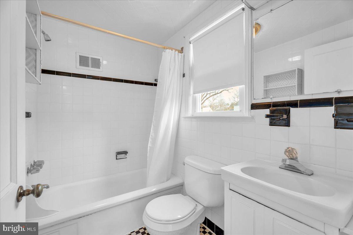 263 Hopkins Road Haddonfield, NJ 08033 - Photo 23 of 38 a bathroom with a sink toilet and shower