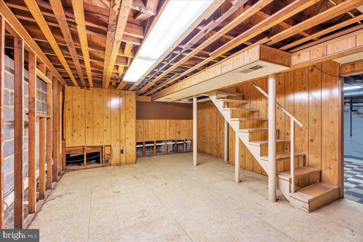 263 Hopkins Road Haddonfield, NJ 08033 - Photo 25 of 38 a view of a room with wooden walls and stairs