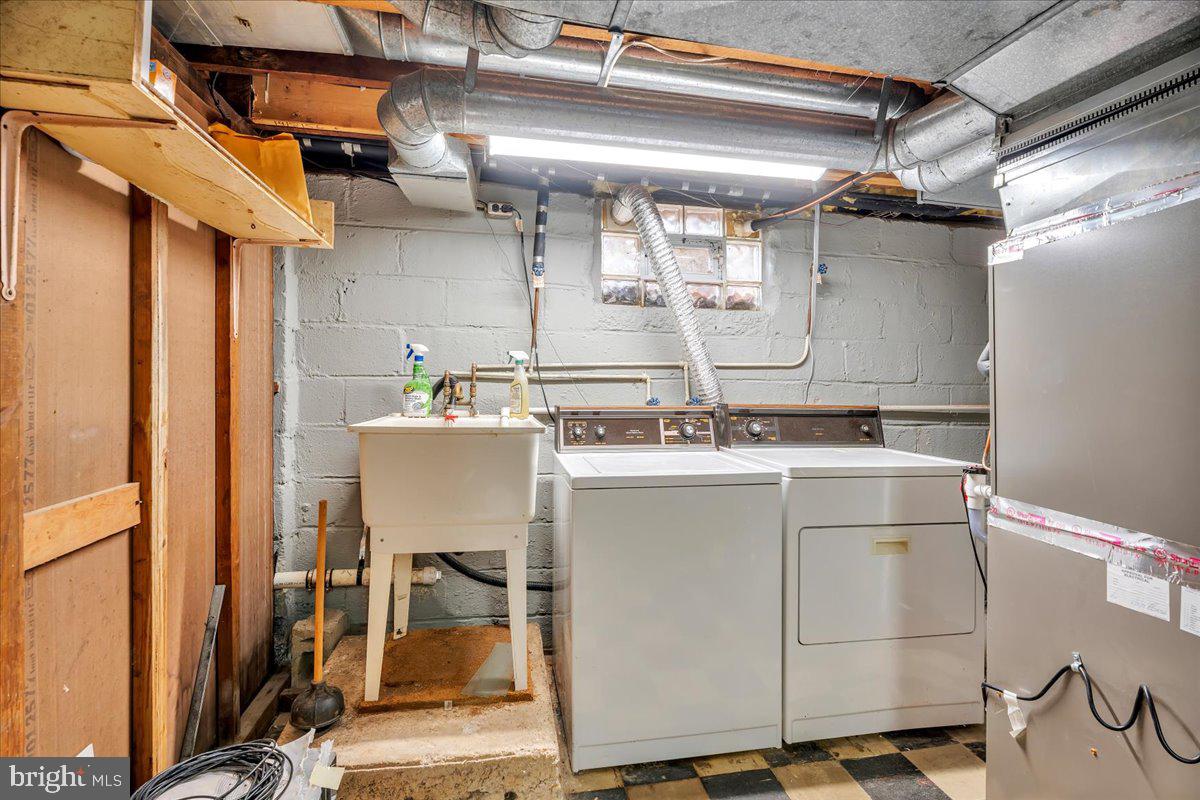263 Hopkins Road Haddonfield, NJ 08033 - Photo 28 of 38 a room with a chair and cabinets