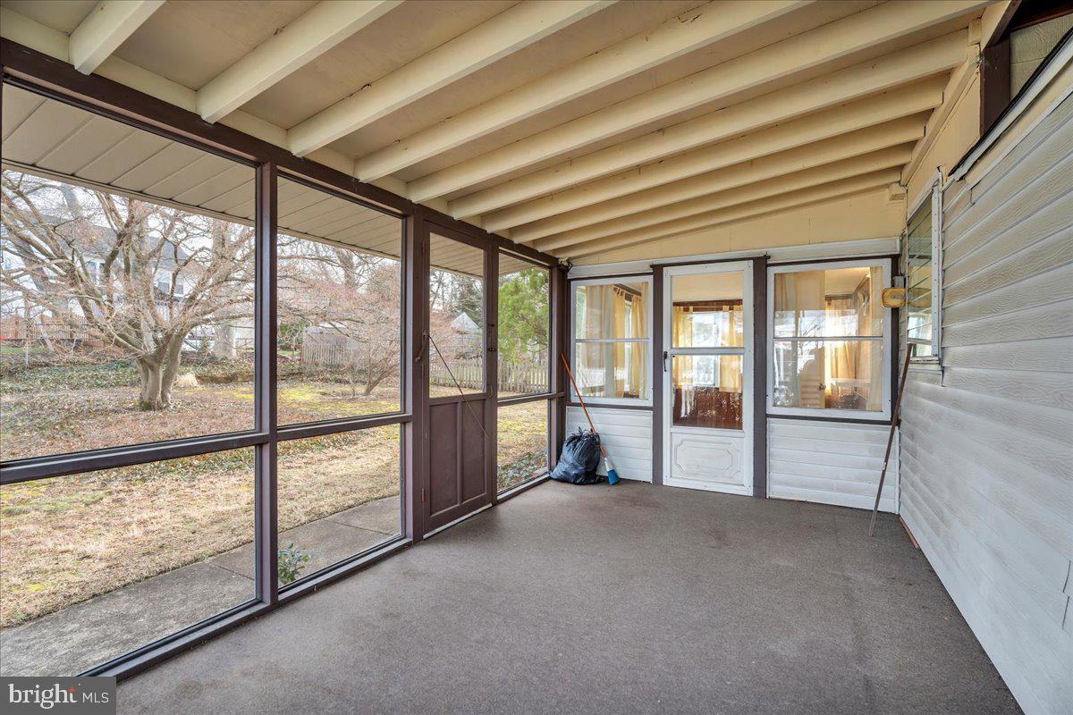 263 Hopkins Road Haddonfield, NJ 08033 - Photo 30 of 38 a view of an empty room with wooden floor and a window