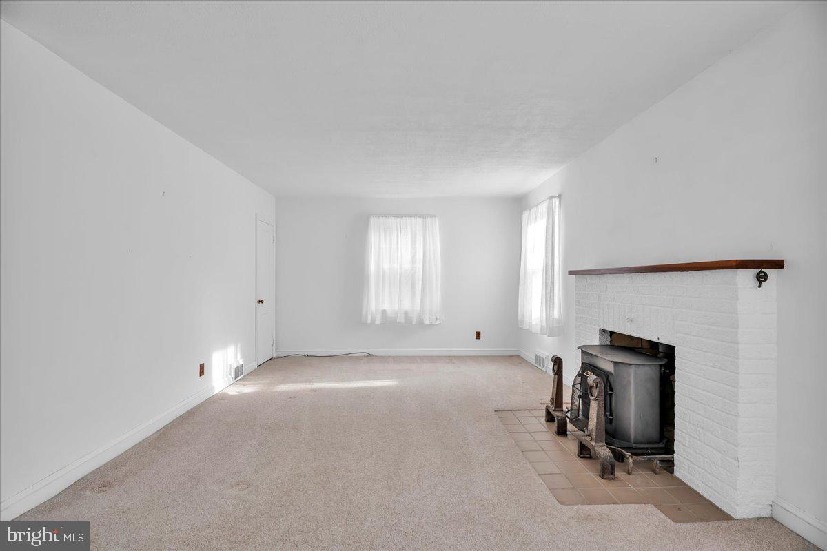 263 Hopkins Road Haddonfield, NJ 08033 - Photo 5 of 38 a view of a livingroom with furniture and a window