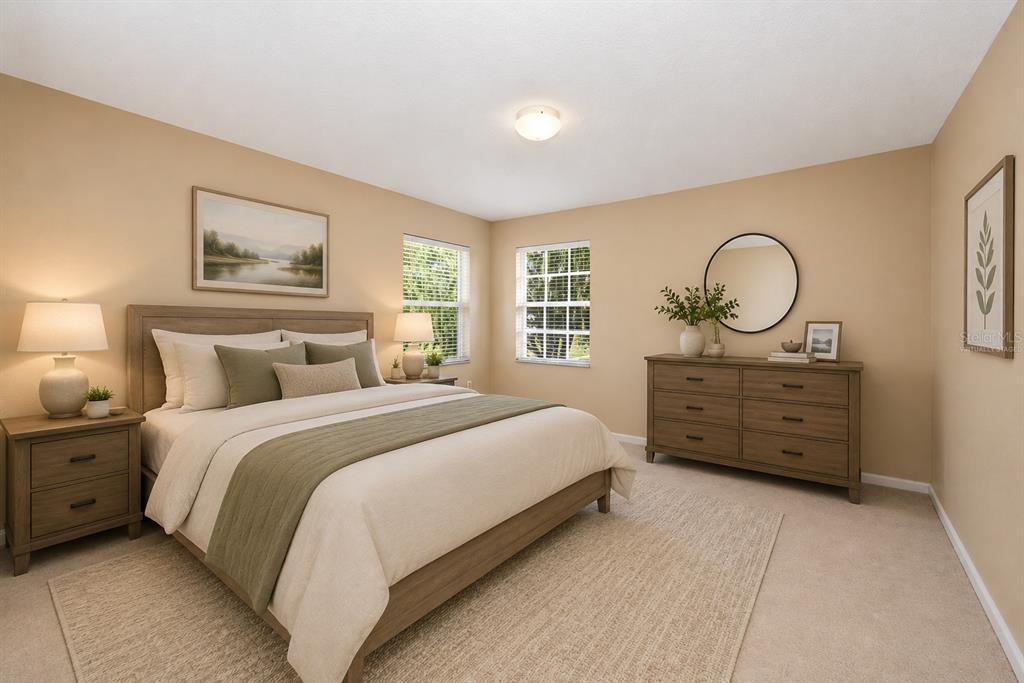936 Kingsridge Circle Gotha, FL 34734 - Photo 17 of 50 a bedroom with a bed and a dresser