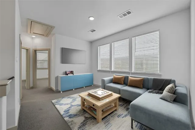 a bathroom with a sink mirror and toilet
