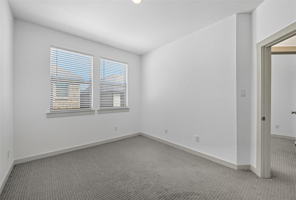 228 Spring Hill Road Flower Mound, TX 75028 - Photo 25 of 31 an empty room with a window