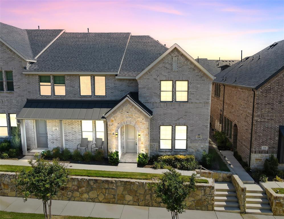 228 Spring Hill Road Flower Mound, TX 75028 - Photo 29 of 31 a front view of a house with a yard