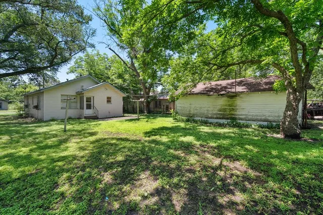 a house view with a swimming pool