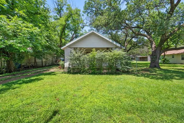 a house view with a garden space
