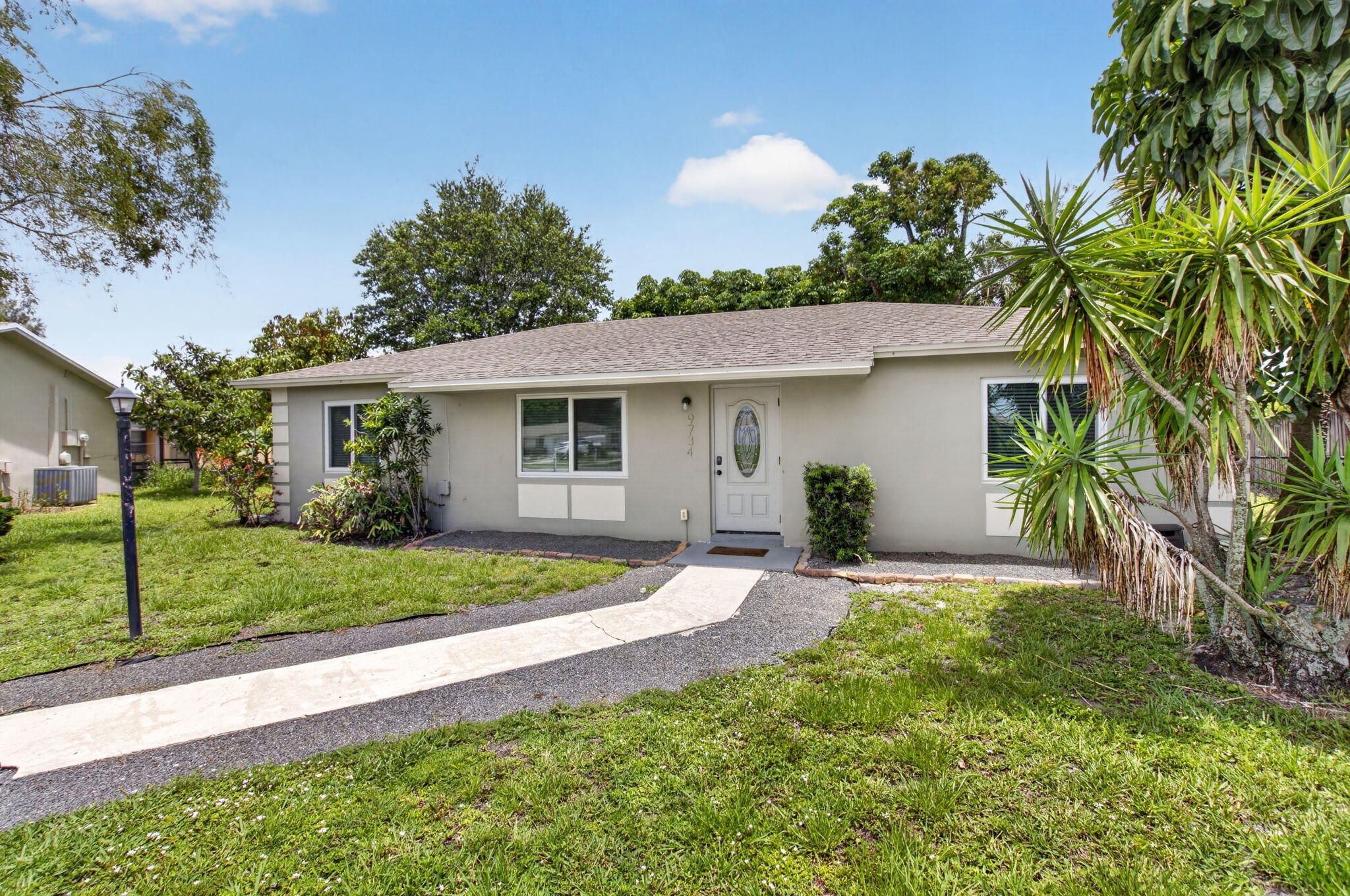 9734 Alaska Circle Boca Raton, FL 33434 - Photo 1 of 25 Front