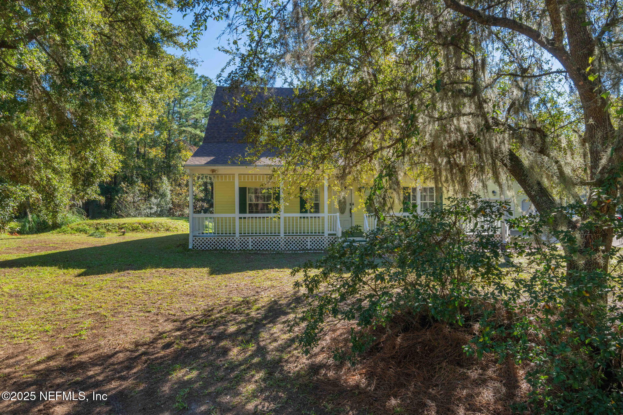8705 River Park Road St. Augustine, FL 32092 - Photo 11 of 57 a view of a house with a yard