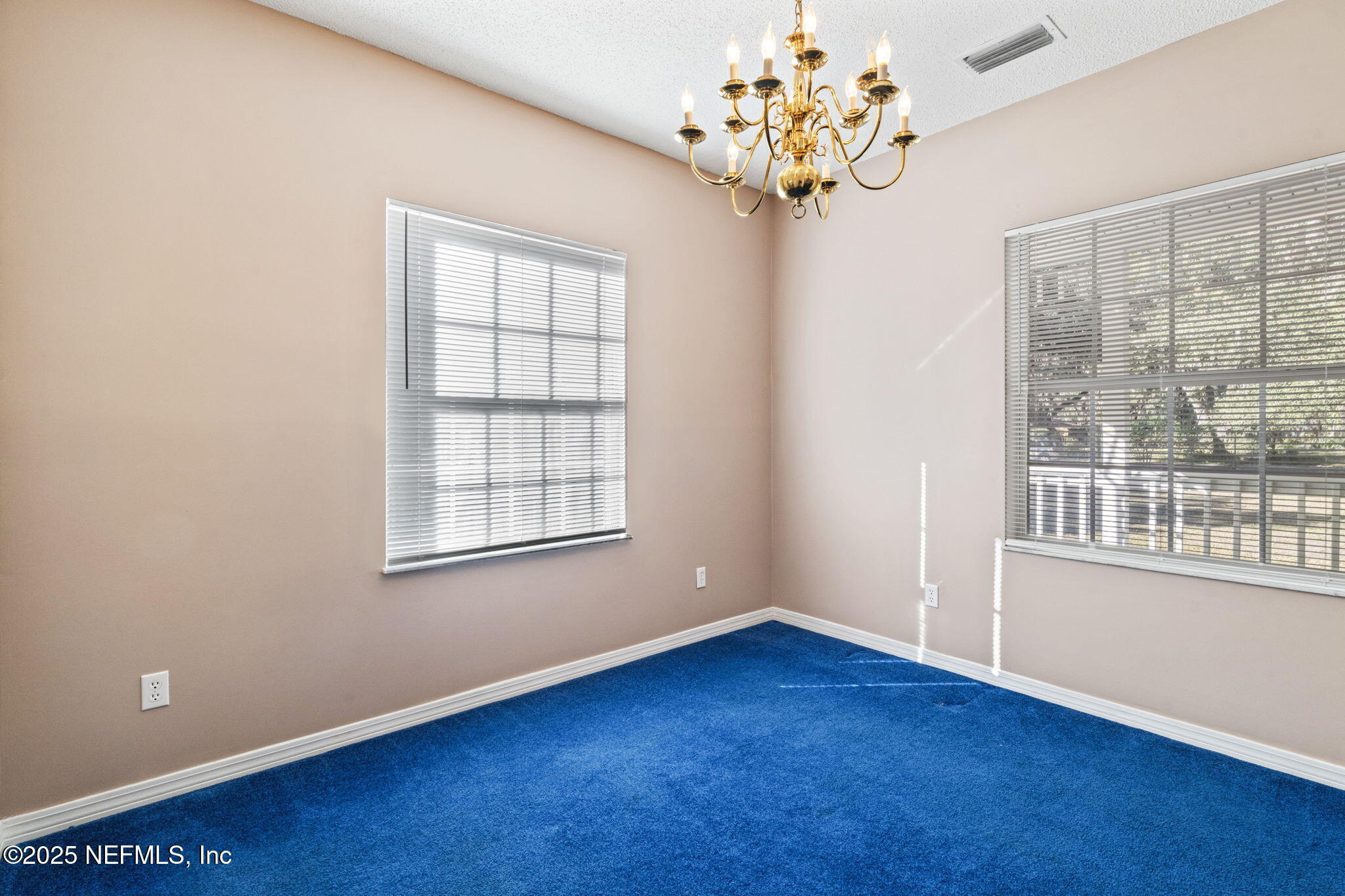 8705 River Park Road St. Augustine, FL 32092 - Photo 21 of 57 a view of an empty room with a window