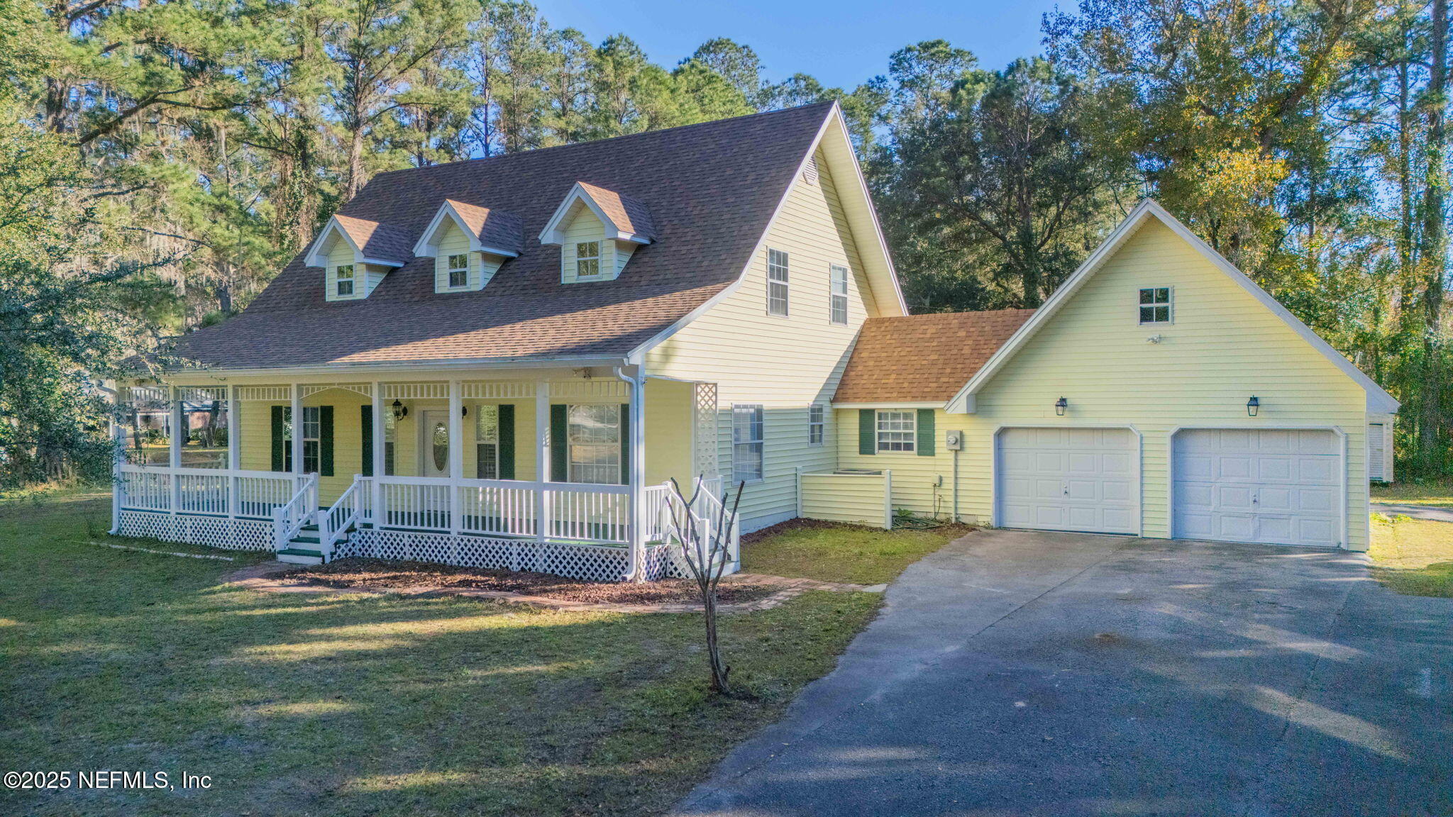 8705 River Park Road St. Augustine, FL 32092 - Photo 3 of 57 a view of a house with a yard and sitting area