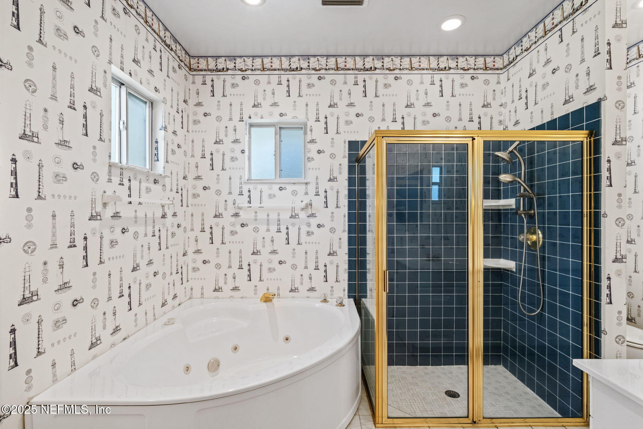 8705 River Park Road St. Augustine, FL 32092 - Photo 35 of 57 a bathroom with a shower and a sink