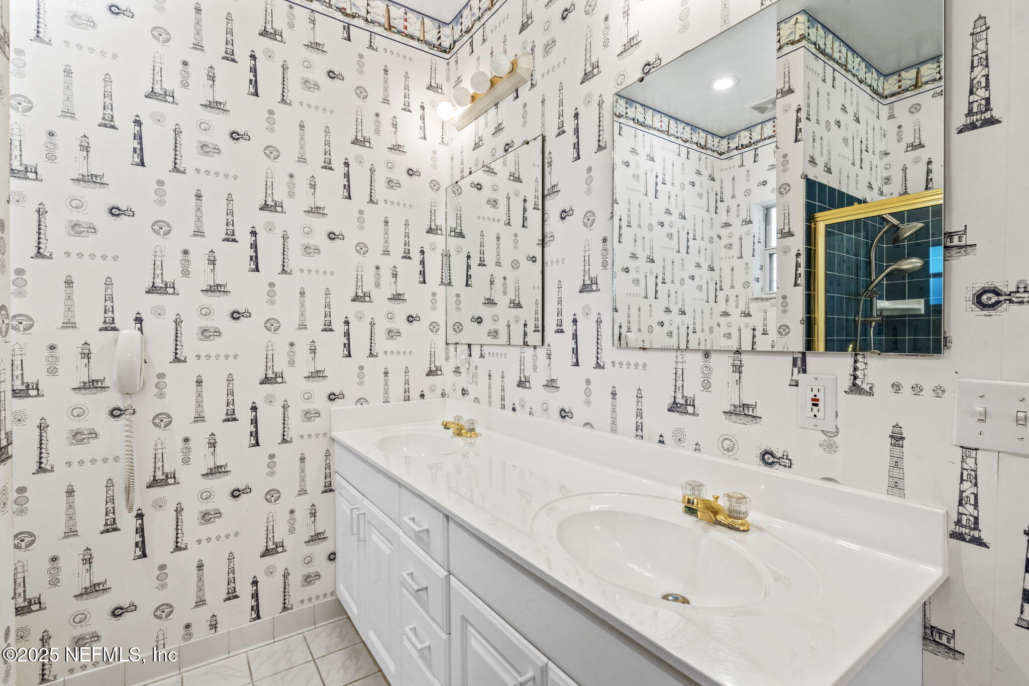 8705 River Park Road St. Augustine, FL 32092 - Photo 36 of 57 a bathroom with a sink and a bathtub