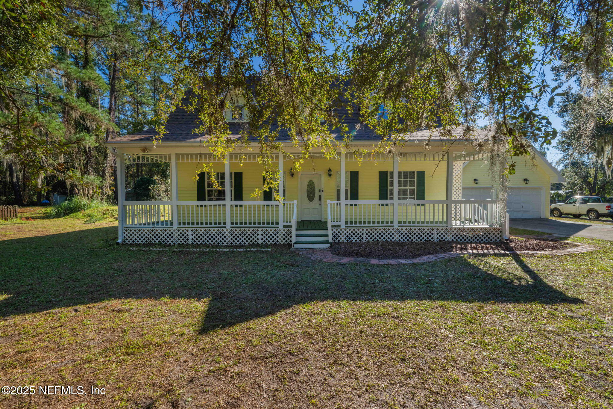 8705 River Park Road St. Augustine, FL 32092 - Photo 5 of 57 front view of a house with a yard