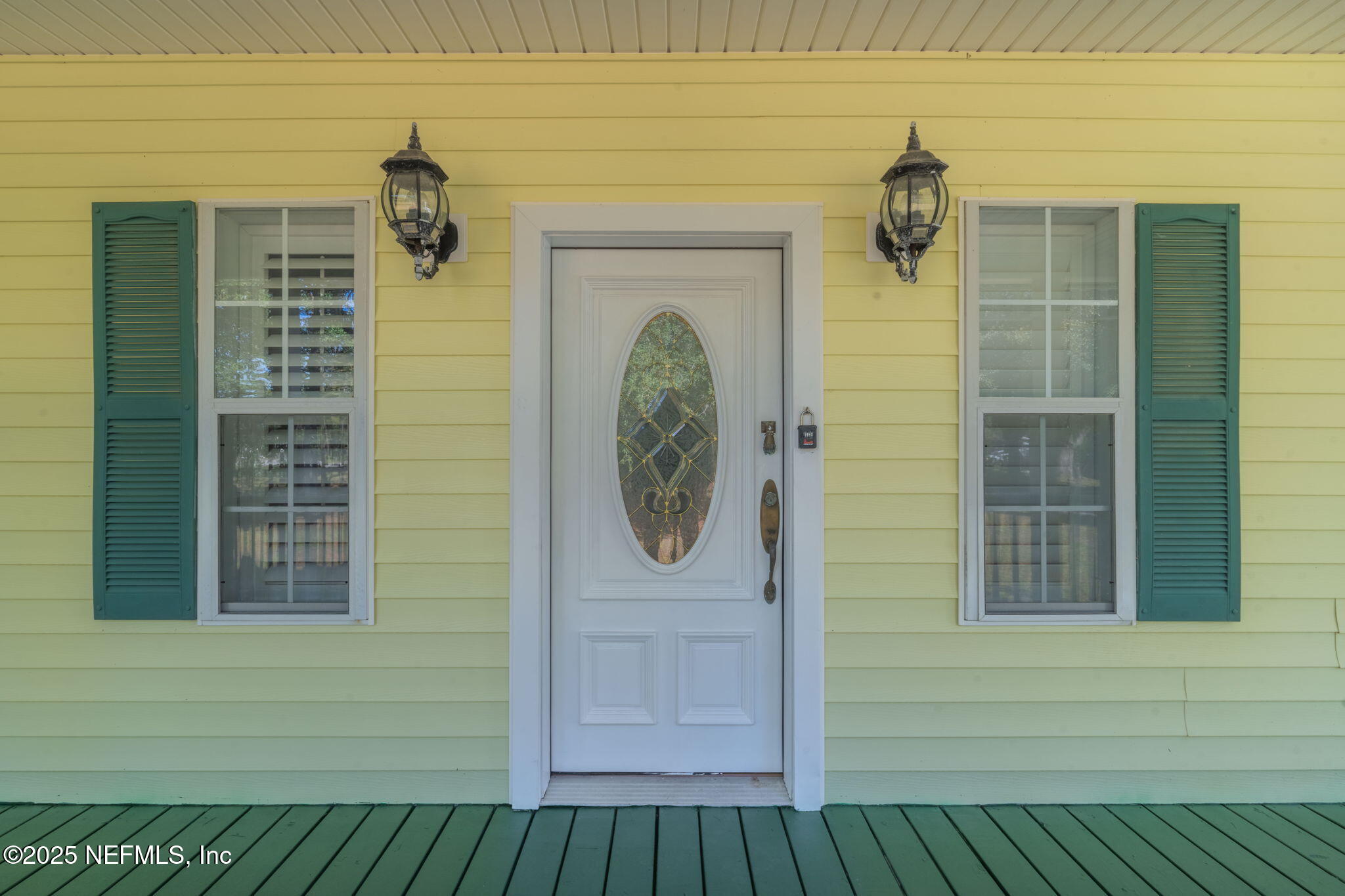 8705 River Park Road St. Augustine, FL 32092 - Photo 7 of 57 a front view of a house with a shower