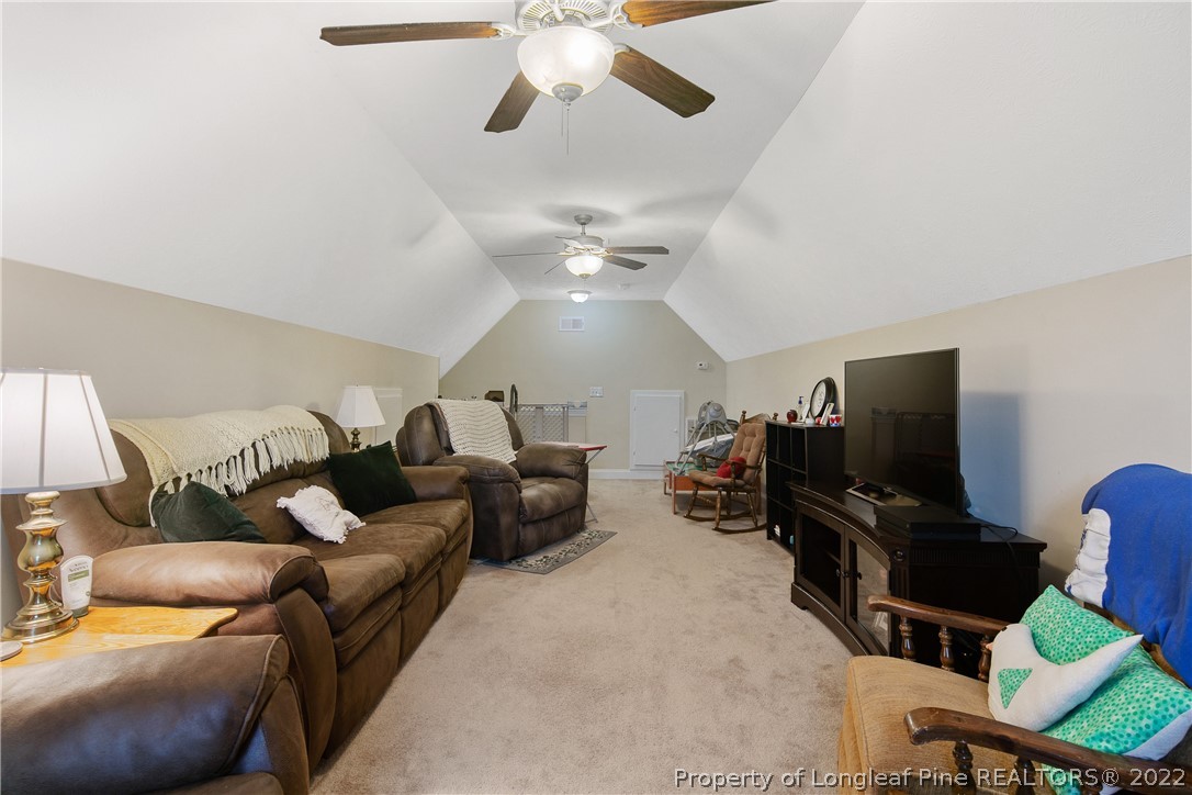 2511 Wade-Stedman Road Stedman, NC 28391 - Photo 42 of 47 a living room with furniture and a flat screen tv