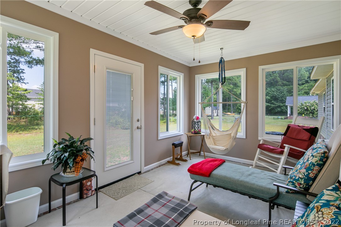 2511 Wade-Stedman Road Stedman, NC 28391 - Photo 44 of 47 a living room with furniture and a potted plant