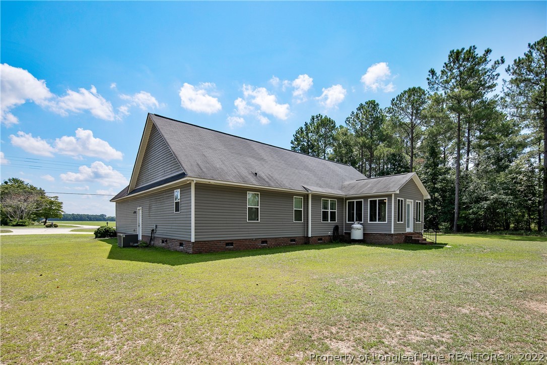 2511 Wade-Stedman Road Stedman, NC 28391 - Photo 46 of 47 a house view with a garden space