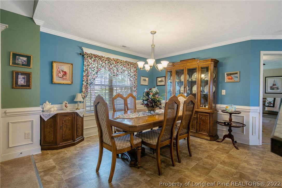 2511 Wade-Stedman Road Stedman, NC 28391 - Photo 10 of 47 a view of a dining room with furniture window and outside view