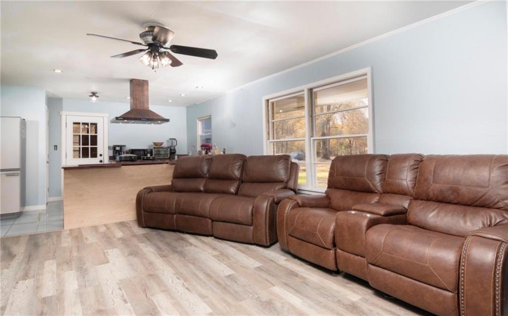 98 Almon Church Road Covington, GA 30014 - Photo 16 of 22 a living room with furniture and a large window