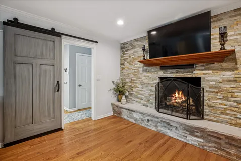 a living room with a fireplace