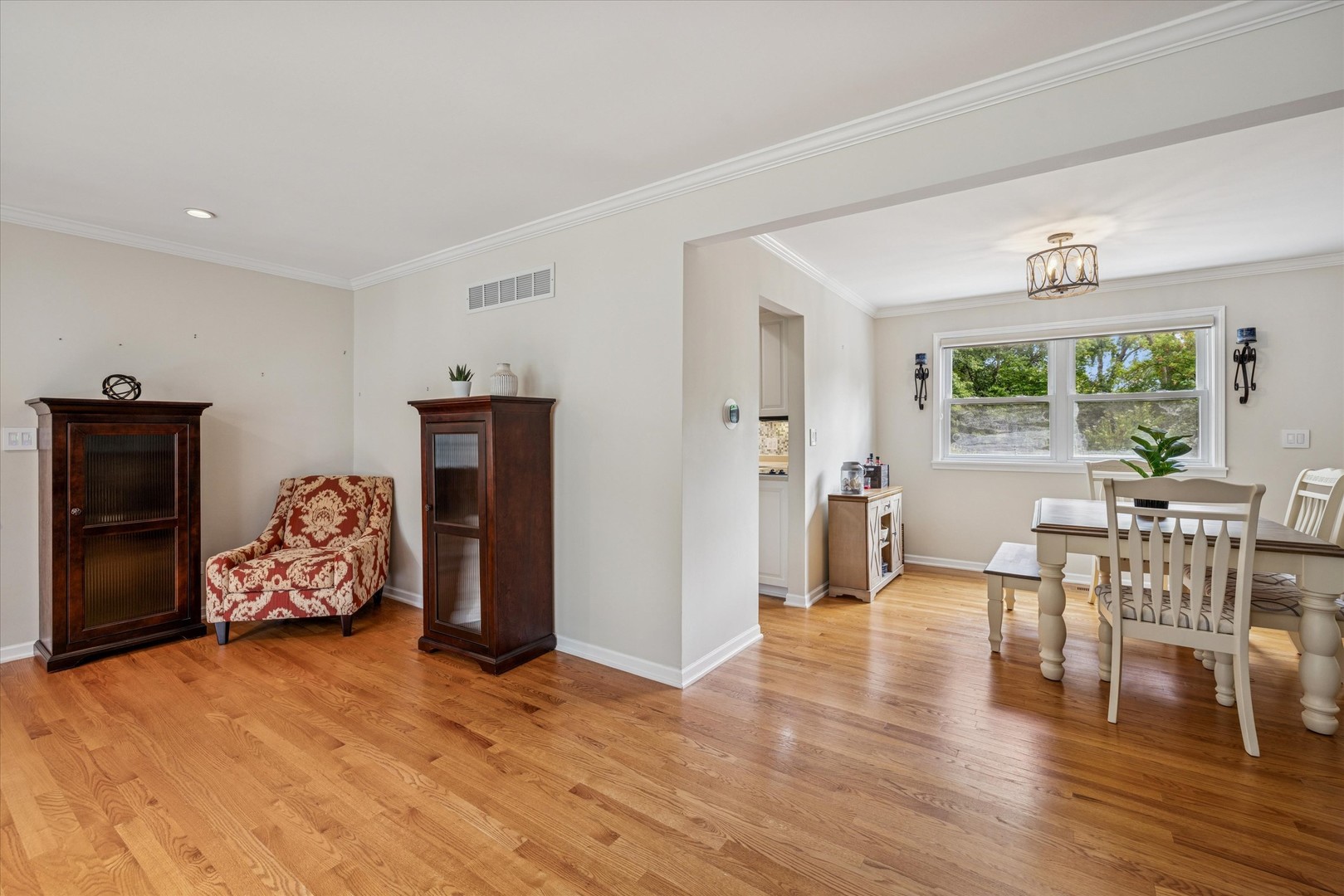 1355 North King George Court Palatine, IL 60067 - Photo 5 of 34 a view of a livingroom with furniture and wooden floor