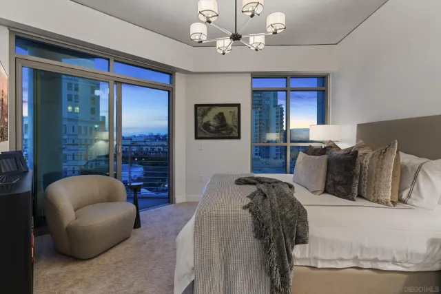 a bathroom with a double vanity sink a mirror and a shower