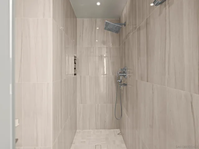 a kitchen with stainless steel appliances granite countertop a stove and refrigerator