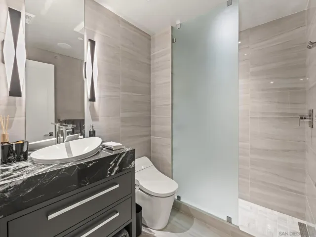 a terrace with outdoor seating city view and barbeque oven