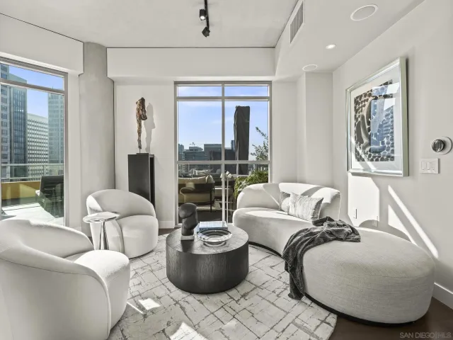 a view of a house with a cars park