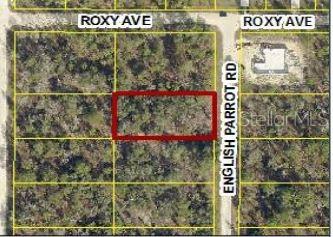 14100 English Parrot Road Weeki Wachee, FL 34614 - Photo 1 of 1 a sign broad on the wall