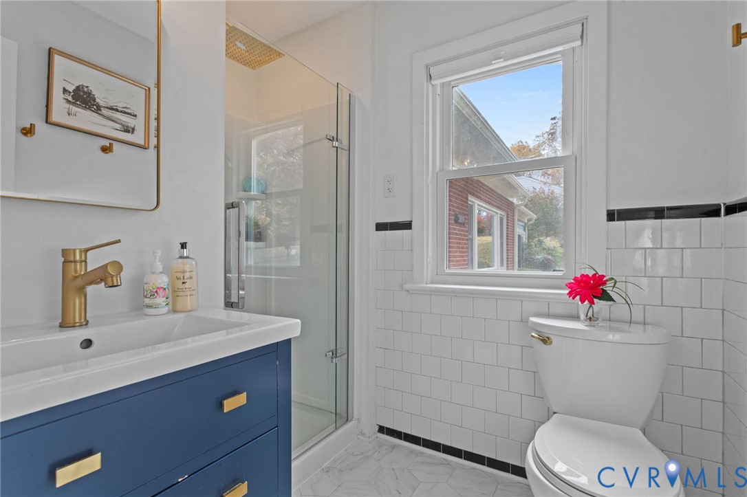 3819 Wakefield Road Richmond, VA 23235 - Photo 22 of 49 Primary bath with updated shower and vanity, LVP f
