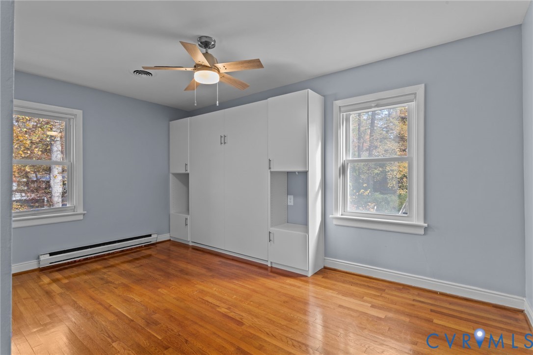 3819 Wakefield Road Richmond, VA 23235 - Photo 24 of 49 a view of empty room with wooden floor and fan