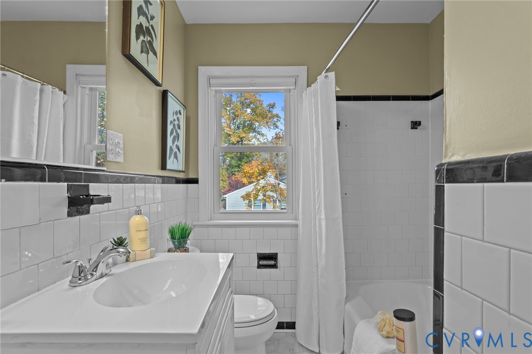 3819 Wakefield Road Richmond, VA 23235 - Photo 28 of 49 a bathroom with a sink toilet and shower