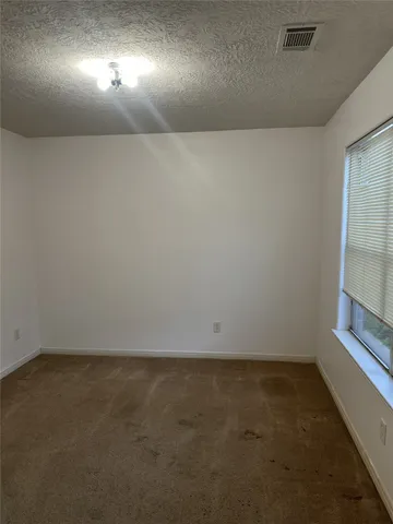 an empty room with a door