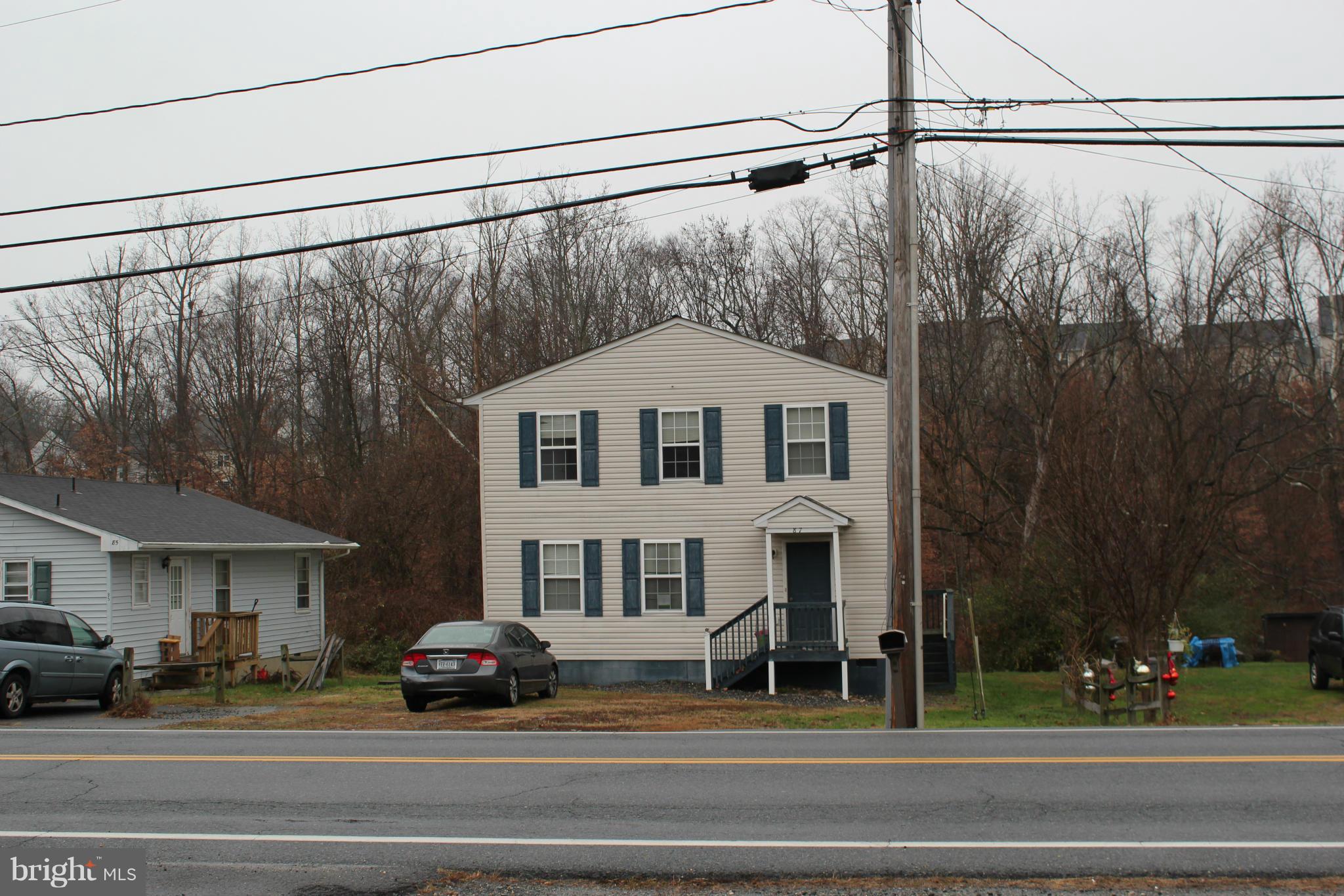 87 Truslow Road Fredericksburg, VA 22405 - Photo 2 of 11 a car parked in front of a house