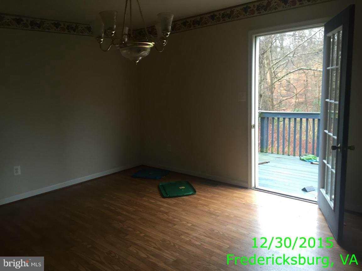 87 Truslow Road Fredericksburg, VA 22405 - Photo 5 of 11 a view of an empty room with a window