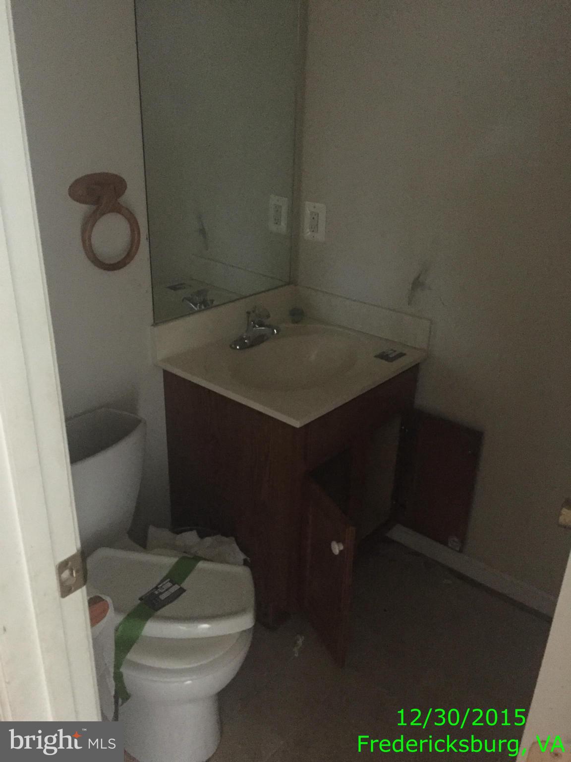 87 Truslow Road Fredericksburg, VA 22405 - Photo 6 of 11 a bathroom with a sink toilet and mirror