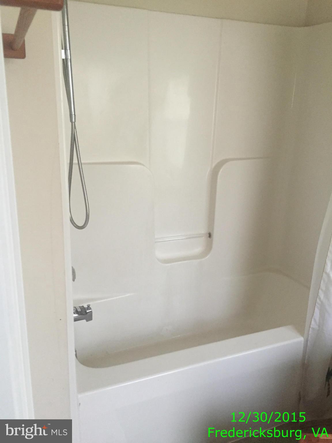 87 Truslow Road Fredericksburg, VA 22405 - Photo 9 of 11 a bathroom with a bath tub