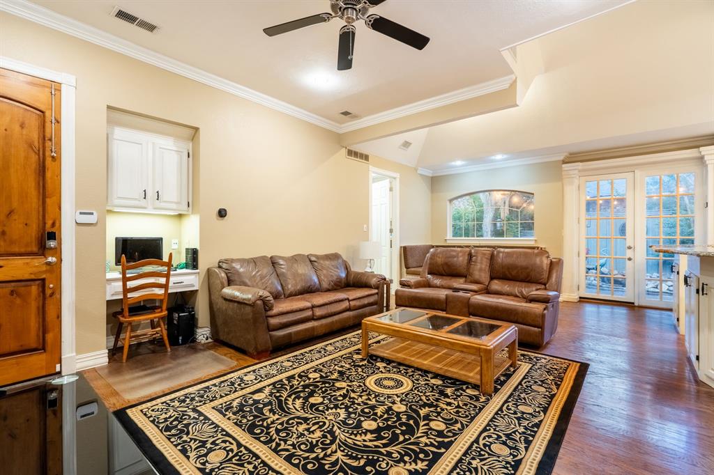 1450 Meandering Way Rockwall, TX 75087 - Photo 15 of 32 a living room with furniture and a rug