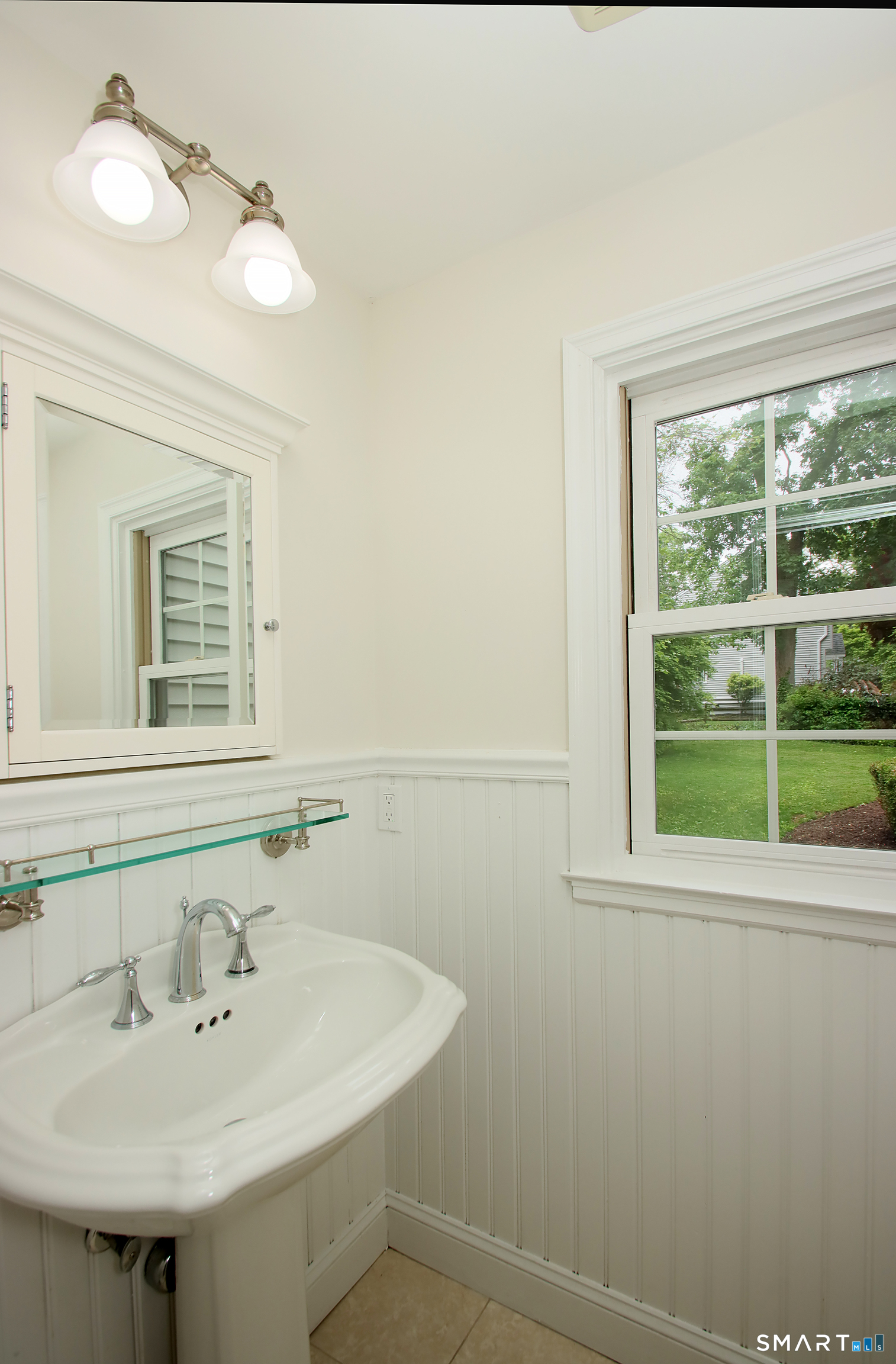 23 Norway Road North Haven, CT 06473 - Photo 21 of 32 a bathroom with a sink and a window