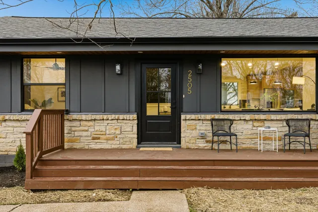 a view of a living room and balcony