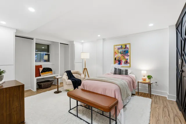 a living room with furniture and a rug