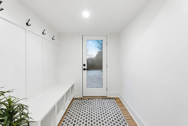 a view of garage yard and tree