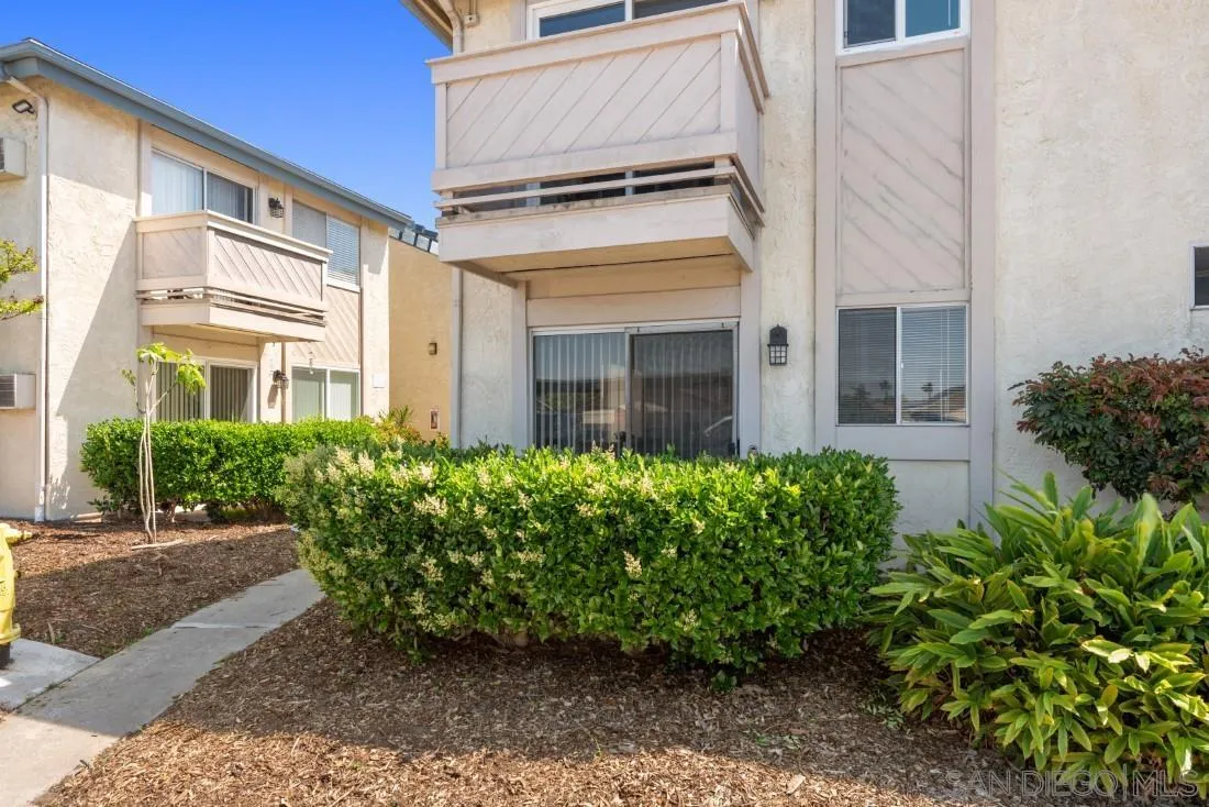 11187 Kelowna Road, Unit 74 San Diego, CA 92126 - Photo 20 of 24 a view of a building with potted plants