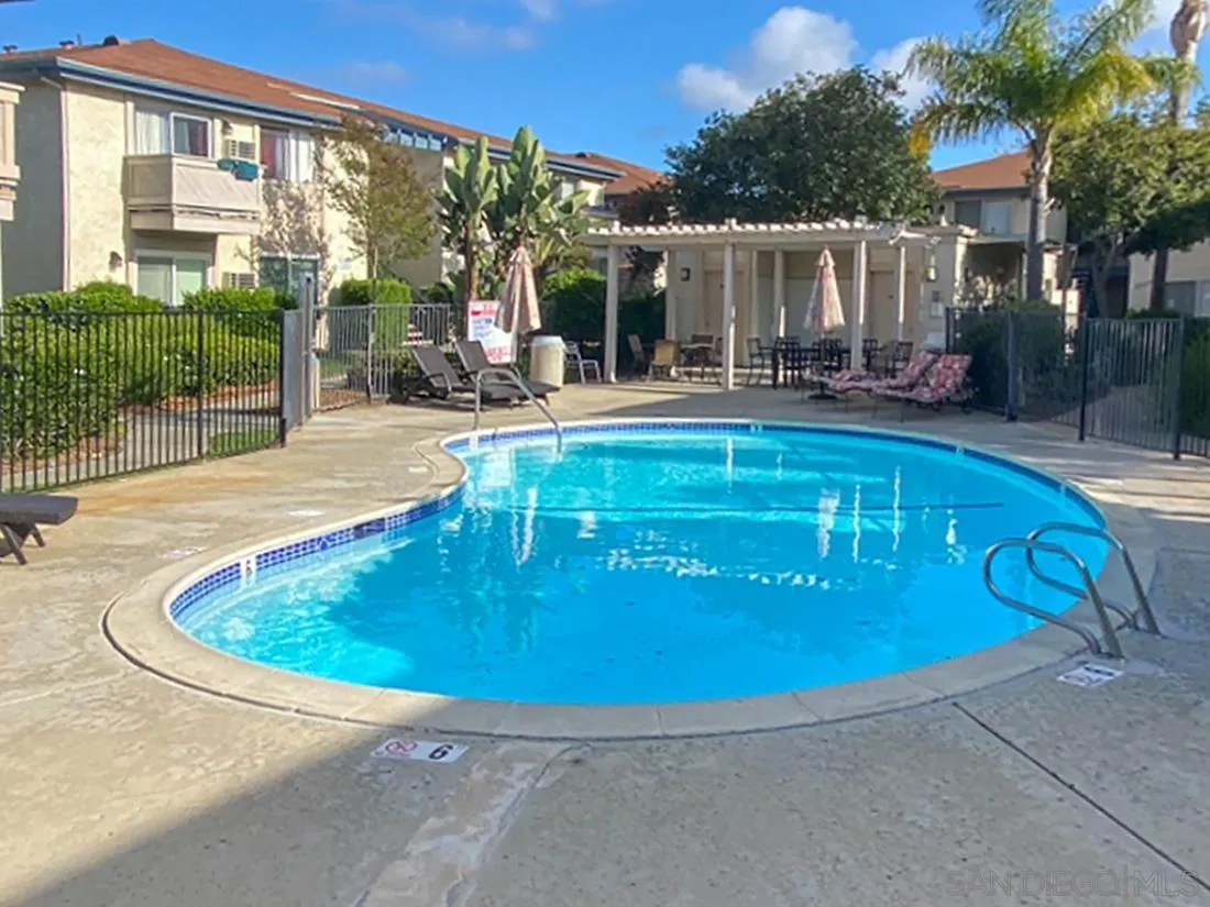 11187 Kelowna Road, Unit 74 San Diego, CA 92126 - Photo 24 of 24 a view of a swimming pool with a patio